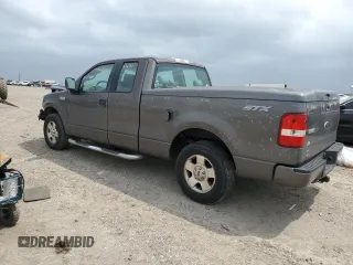 2005 Ford F-150 STX with VIN 1FTRX12W95FB29630, listed as a Copart auction lot 51156355 with 197,091 mi miles and Salvage Title. Bid and sale history available at carsss.com. Image 2.