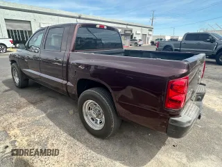 2005 Dodge Dakota ST with VIN 1D7HE28N75S204425, listed as a Copart auction lot 55522755 with 122,452 mi miles and Clean Title. Bid and sale history available at carsss.com. Image 3.