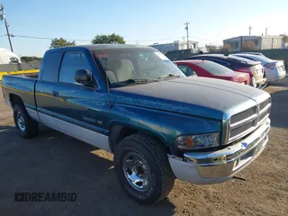 1999 Dodge Ram 2500 with VIN 3B7KC23Z5XG118959, listed as a IAAI auction lot 40484594 with 176,946 mi miles. Bid and sale history available at carsss.com. Image 1.