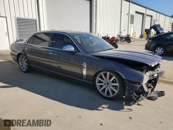 2008 Jaguar XJ Vanden Plas with VIN SAJWA82B08SH20004, listed as a Copart auction lot 87594075 with 130,172 mi miles and Salvage Title. Bid and sale history available at carsss.com. Image 4.