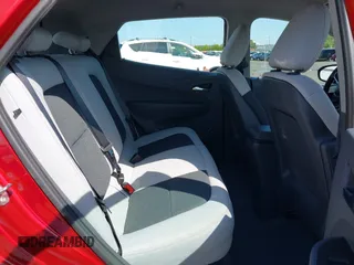 2019 Chevrolet Bolt EV LT z VIN 1G1FY6S02K4104254, wystawiony jako IAAI lot #42161627 z przebiegiem 41 363 mil mil oraz . Historia ofert i sprzedaży dostępna na DreamBid. Obrazek 8.
