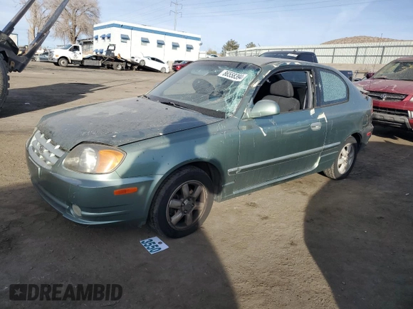 2003 Hyundai Accent GL with VIN KMHCG35CX3U242848, listed as a Copart auction lot 86558394 with 56,248 mi miles and Salvage Title. Bid and sale history available at carsss.com. Image 1.