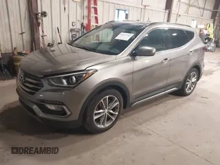 2017 Hyundai Santa Fe 2.0T with VIN 5XYZUDLA4HG424259, listed as a IAAI auction lot 42657783 with 213,040 mi miles and . Bid and sale history available at DreamBid. Image 17.