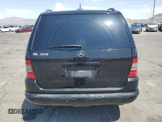 2001 Mercedes-Benz M 320/430/500 with VIN 4JGAB54EX1A241105, listed as a Copart auction lot 59773455 with 242,944 mi miles and Salvage title. Bid and sale history available at DreamBid. Image 6.