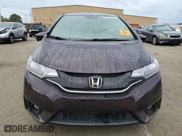 2017 Honda Fit EX-L z VIN JHMGK5H94HS012997, wystawiony jako Copart lot #82567174 z przebiegiem 64 258 mil mil oraz Czysty tytuł • Clean title. Historia ofert i sprzedaży dostępna na DreamBid. Obrazek 5.