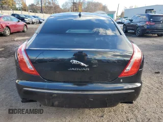 2015 Jaguar XJ Portfolio with VIN SAJWJ2GD2F8V76289, listed as a Copart auction lot 48222815 with 95,420 mi miles and Salvage title. Bid and sale history available at DreamBid. Image 6.