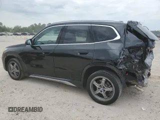 2025 BMW X1 xDrive28i with VIN WBX73EF05S5097084, listed as a Copart auction lot 53444165 with 233 mi miles and Salvage Title. Bid and sale history available at carsss.com. Image 2.