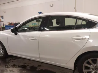 2016 Mazda Mazda6 i Sport with VIN JM1GJ1U54G1473671, listed as a IAAI auction lot 41576038 with 88,386 mi miles. Bid and sale history available at carsss.com. Image 15.