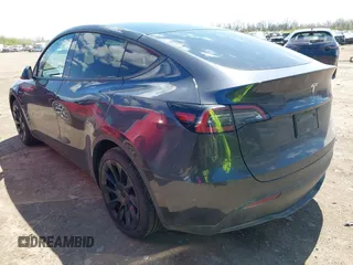 2024 Tesla Model Y Long Range with VIN 7SAYGAEE4RF078906, listed as a IAAI auction lot 42051207 with Not Provided miles and . Bid and sale history available at DreamBid. Image 3.
