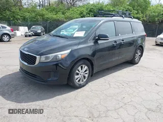 2016 Kia Sedona LX with VIN KNDMB5C13G6209401, listed as a IAAI auction lot 42091953 with 171,068 mi miles. Bid and sale history available at carsss.com. Image 2.