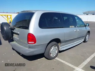 2000 Dodge Caravan SE with VIN 1B4GP44G1YB680819, listed as a IAAI auction lot 42057681 with 23,422 mi miles. Bid and sale history available at carsss.com. Image 4.