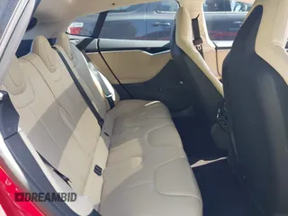 2013 Tesla Model S с VIN 5YJSA1CN1DFP09577, выставлен на аукционе IAAI как лот 41626684 с пробегом 128 289 миль миль и . История ставок и продаж доступна на DreamBid. Изображение 8.