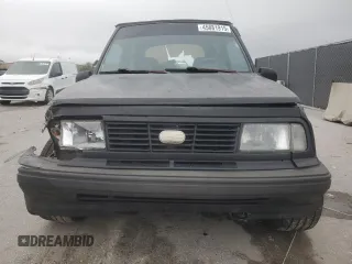 1994 Geo Tracker z VIN 2CNBE18U9R6936156, wystawiony jako Copart lot #45881915 z przebiegiem 201 227 mil mil oraz Szkody całkowita. Historia ofert i sprzedaży dostępna na DreamBid. Obrazek 5.