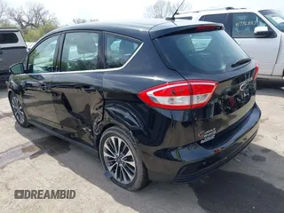 2017 Ford C-Max Energi Titanium with VIN 1FADP5FU2HL115199, listed as a IAAI auction lot 42001944 with 57,609 mi miles. Bid and sale history available at carsss.com. Image 3.