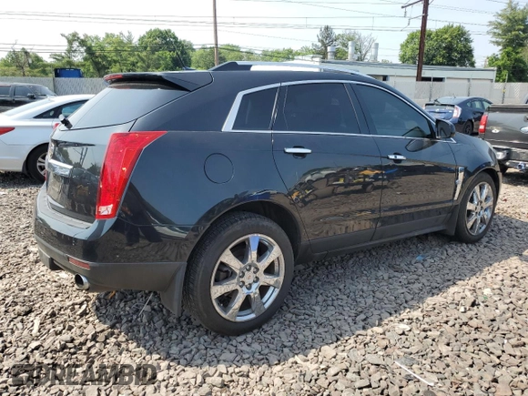 2011 Cadillac SRX Premium Collection z VIN 3GYFNFEY9BS606335, wystawiony jako Copart lot #59009285 z przebiegiem 152 828 mil mil oraz Szkoda całkowita • Salvage title. Historia ofert i sprzedaży dostępna na DreamBid. Obrazek 3.