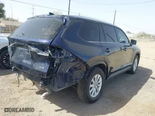 2024 Toyota Grand Highlander XLE with VIN 5TDAAAB59RS059896, listed as a IAAI auction lot 41691709 with 7,294 mi miles. Bid and sale history available at carsss.com. Image 4.