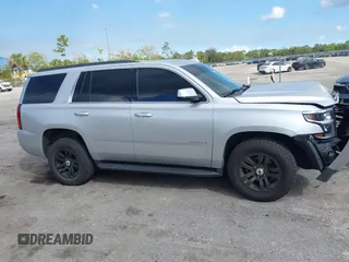 2018 Chevrolet Tahoe LT with VIN 1GNSCBKCXJR367852, listed as a IAAI auction lot 41549304 with 151,684 mi miles and . Bid and sale history available at DreamBid. Image 14.