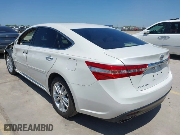 2014 Toyota Avalon Limited with VIN 4T1BK1EB2EU083624, listed as a IAAI auction lot 41963742 with 94,140 mi miles. Bid and sale history available at carsss.com. Image 3.