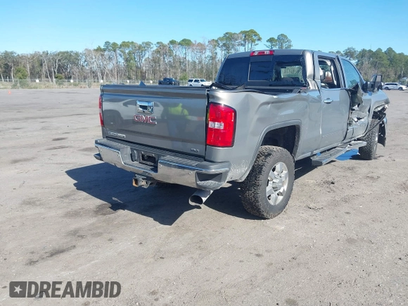 2017 GMC Sierra 2500HD SLT with VIN 1GT12TEY1HF165837, listed as a IAAI auction lot 41230286 with 167,824 mi miles. Bid and sale history available at carsss.com. Image 4.