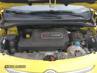 2014 FIAT 500L Trekking with VIN ZFBCFADH6EZ013536, listed as a IAAI auction lot 40313919 with 77,690 mi miles and . Bid and sale history available at DreamBid. Image 10.