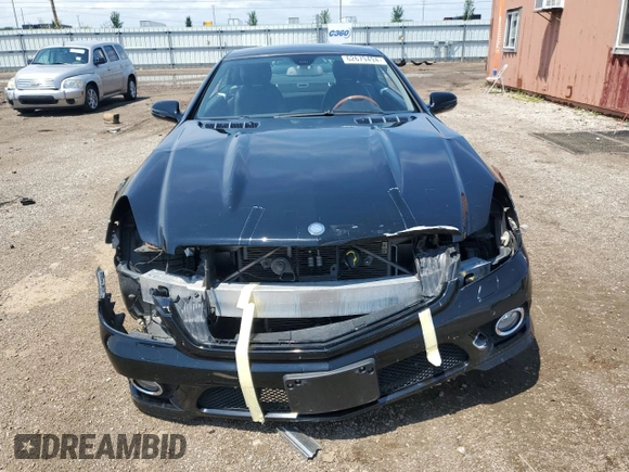 2009 Mercedes-Benz SL 550 with VIN WDBSK71F79F146967, listed as a Copart auction lot 62679494 with 57,412 mi miles and Salvage title. Bid and sale history available at DreamBid. Image 5.