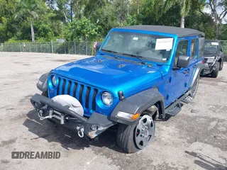 2022 Jeep Wrangler Unlimited Sport with VIN 1C4HJXDG3NW117155, listed as a IAAI auction lot 40240879 with 36,323 mi miles and . Bid and sale history available at DreamBid. Image 17.