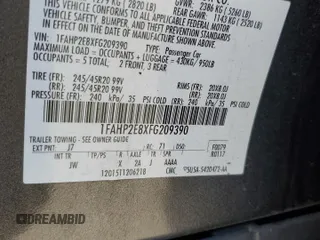 2015 Ford Taurus SEL with VIN 1FAHP2E8XFG209390, listed as a Copart auction lot 58992305 with 99,498 mi miles and Salvage title. Bid and sale history available at DreamBid. Image 12.