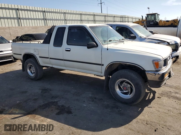 1993 Toyota Pickup DLX z VIN JT4VN13D3P5125406, wystawiony jako Copart lot #75011624 z przebiegiem 152 663 mil mil oraz Szkoda całkowita • Salvage title. Historia ofert i sprzedaży dostępna na DreamBid. Obrazek 4.