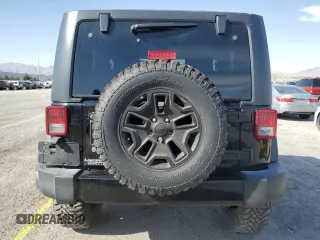 2017 Jeep Wrangler Sport with VIN 1C4AJWAGXHL715362, listed as a Copart auction lot 51262305 with 62,297 mi miles and Salvage Title. Bid and sale history available at DreamBid. Image 6.
