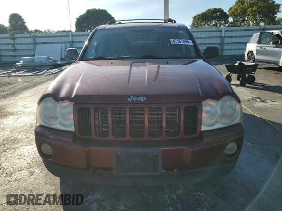 2007 Jeep Grand Cherokee Laredo z VIN 1J8GR48K07C649302, wystawiony jako Copart lot #82167894 z przebiegiem 255 780 mil mil oraz Czysty tytuł • Clean title. Historia ofert i sprzedaży dostępna na DreamBid. Obrazek 5.