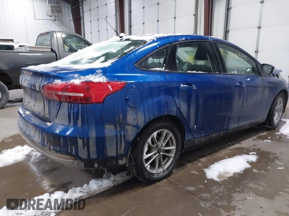 2018 Ford Focus SE z VIN 1FADP3F26JL312725, wystawiony jako IAAI lot #41488559 z przebiegiem 30 686 mil mil oraz . Historia ofert i sprzedaży dostępna na DreamBid. Obrazek 4.