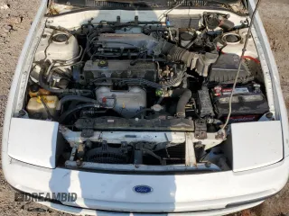 1990 Ford Probe GL z VIN 1ZVPT20CXL5212307, wystawiony jako Copart lot #54941994 z przebiegiem 241 227 mil mil oraz Szkody całkowita. Historia ofert i sprzedaży dostępna na DreamBid. Obrazek 12.