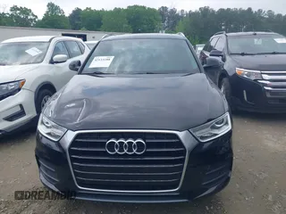 2016 Audi Q3 Premium Plus with VIN WA1BFCFSXGR022587, listed as a IAAI auction lot 42133288 with 141,609 mi miles. Bid and sale history available at carsss.com. Image 12.