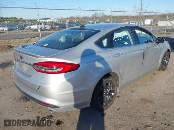 2018 Ford Fusion S with VIN 3FA6P0G73JR184463, listed as a IAAI auction lot 41763862 with 140,276 mi miles. Bid and sale history available at carsss.com. Image 4.