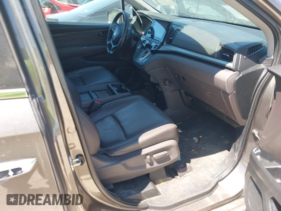2020 Honda Odyssey Touring with VIN 5FNRL6H87LB002202, listed as a IAAI auction lot 42015741 with 182,051 mi miles and . Bid and sale history available at DreamBid. Image 5.