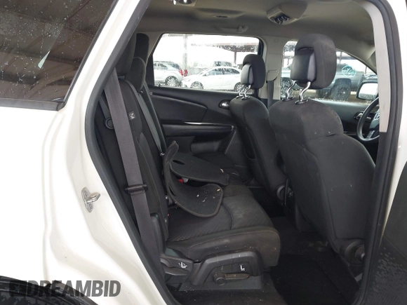 2019 Dodge Journey SE with VIN 3C4PDCBB7KT797842, listed as a IAAI auction lot 42036147 with 163,919 mi miles and . Bid and sale history available at DreamBid. Image 8.