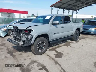 2018 Toyota Tacoma SR with VIN 3TMCZ5AN6JM170128, listed as a IAAI auction lot 42038979 with 59,497 mi miles. Bid and sale history available at carsss.com. Image 19.