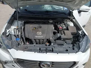 2018 Mazda CX-3 Touring z VIN JM1DKDC75J0326180, wystawiony jako IAAI lot #41787541 z przebiegiem 96 584 mil mil oraz . Historia ofert i sprzedaży dostępna na DreamBid. Obrazek 10.