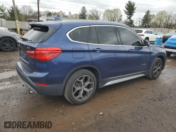 2017 BMW X1 xDrive28i with VIN WBXHT3C3XH5F69573, listed as a Copart auction lot 52719715 with 93,981 mi miles and Salvage Title. Bid and sale history available at DreamBid. Image 3.