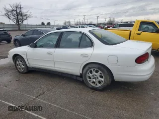 2000 Oldsmobile Intrigue GX z VIN 1G3WH52H8YF257547, wystawiony jako Copart lot #79727714 z przebiegiem 132 156 mil mil oraz Szkody całkowita. Historia ofert i sprzedaży dostępna na DreamBid. Obrazek 2.