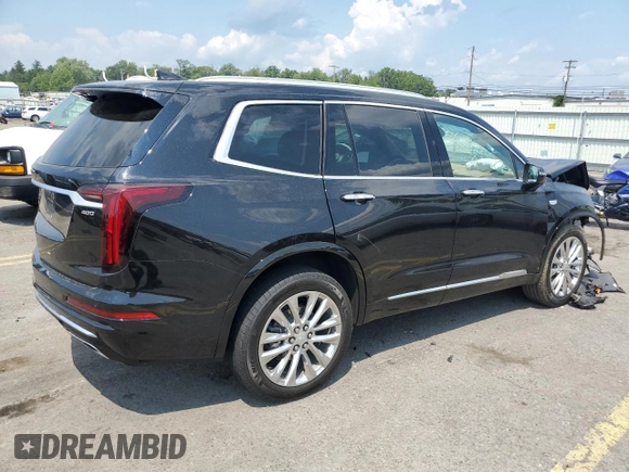 2023 Cadillac XT6 AWD Premium Luxury z VIN 1GYKPFRS7PZ225950, wystawiony jako Copart lot #65573174 z przebiegiem Nie podano mil oraz Szkoda całkowita • Salvage title. Historia ofert i sprzedaży dostępna na DreamBid. Obrazek 3.