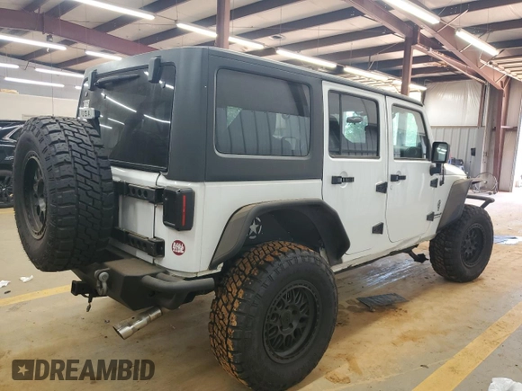 2012 Jeep Wrangler Unlimited Sport z VIN 1C4BJWDG4CL140250, wystawiony jako Copart lot #55174665 z przebiegiem 91 285 mil mil oraz Szkoda całkowita • Salvage title. Historia ofert i sprzedaży dostępna na DreamBid. Obrazek 3.