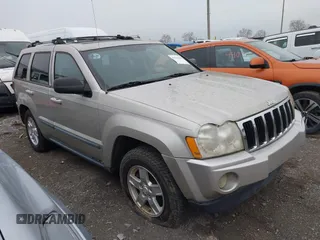 2007 Jeep Grand Cherokee Laredo z VIN 1J8GR48K17C537088, wystawiony jako IAAI lot #41845987 z przebiegiem 143 661 mil mil oraz . Historia ofert i sprzedaży dostępna na DreamBid. Obrazek 1.