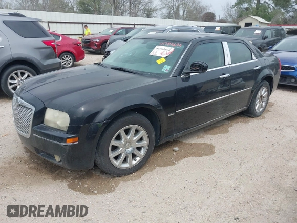 2010 Chrysler 300 Touring with VIN 2C3CA5CV0AH329717, listed as a IAAI auction lot 41785694 with 257,072 mi miles. Bid and sale history available at carsss.com. Image 2.