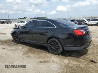 2014 Ford Police Interceptor with VIN 1FAHP2MT2EG161579, listed as a Copart auction lot 53878845 with 205,031 mi miles and Salvage title. Bid and sale history available at DreamBid. Image 2.