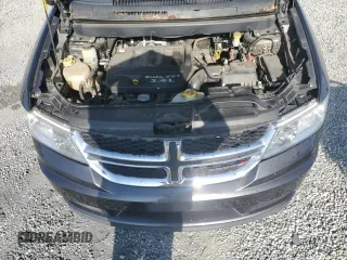 2014 Dodge Journey American Value with VIN 3C4PDCABXET277897, listed as a Copart auction lot 60566735 with 113,343 mi miles and Salvage title. Bid and sale history available at DreamBid. Image 12.