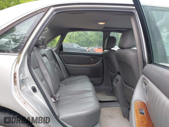 2003 Toyota Avalon XL z VIN 4T1BF28B13U293991, wystawiony jako IAAI lot #42358965 z przebiegiem 142 424 mil mil oraz . Historia ofert i sprzedaży dostępna na DreamBid. Obrazek 8.