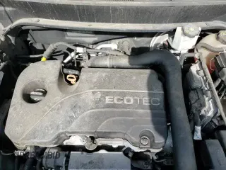 2018 Chevrolet Equinox Premier z VIN 3GNAXMEV8JS531458, wystawiony jako Copart lot #69405575 z przebiegiem 112 739 mil mil oraz Szkoda całkowita • Salvage title. Historia ofert i sprzedaży dostępna na DreamBid. Obrazek 13.