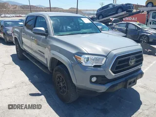 2021 Toyota Tacoma SR5 with VIN 3TMAZ5CN1MM155030, listed as a IAAI auction lot 42699525 with 80,020 mi miles and . Bid and sale history available at DreamBid. Image 1.