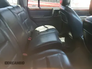 1997 Jeep Grand Cherokee Limited with VIN 1J4GZ78Y7VC573971, listed as a Copart auction lot 61358024 with 171,055 mi miles and Salvage Title. Bid and sale history available at carsss.com. Image 10.